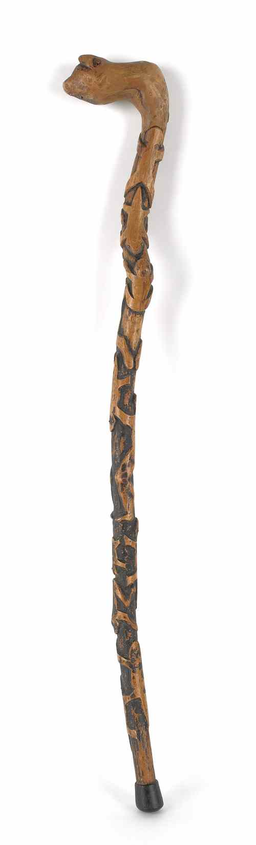 Appraisal: Carved cane with relief carved animals early th c