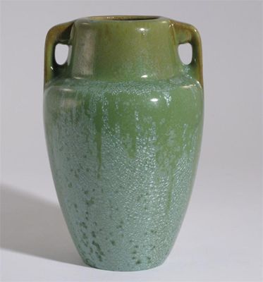 Appraisal: A Fulper Pottery twin-handled vase covered in a green crystalline