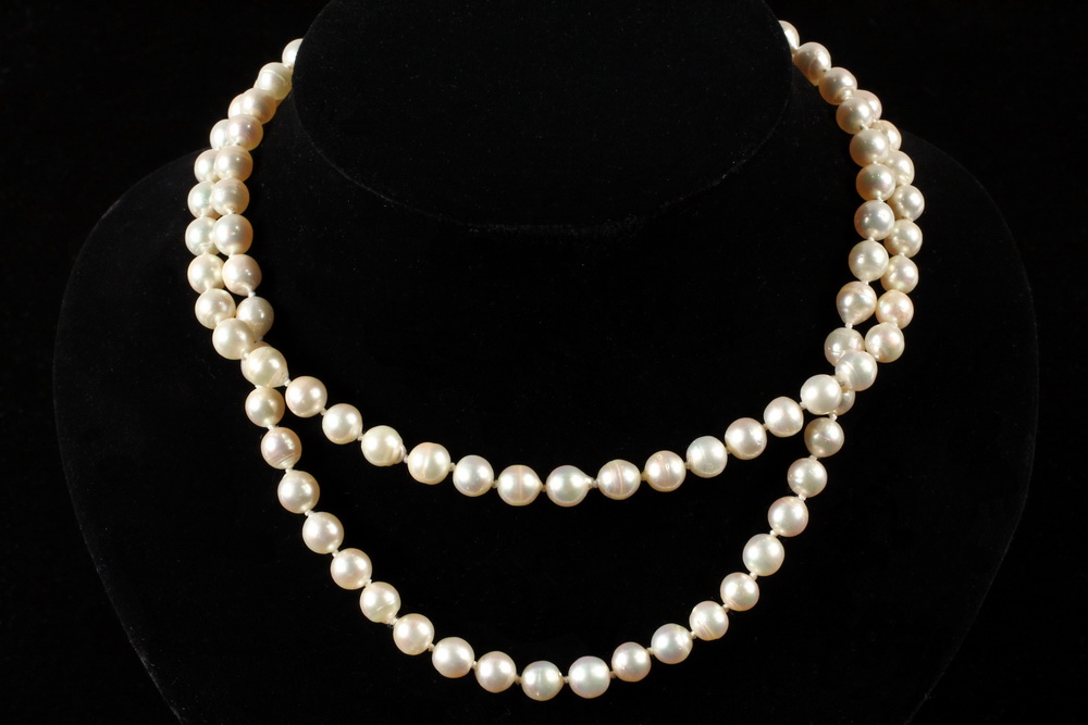 Appraisal: NECKLACE - Double Strand Necklace of mm Baroque Pearls set