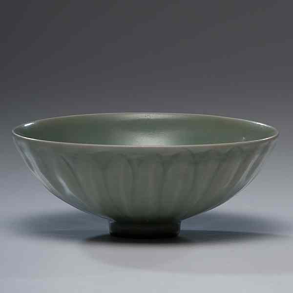 Appraisal: Celadon Lotus Petal Bowl Chinese A bowl having rounded sides