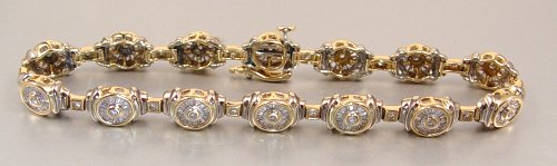 Appraisal: CT DIAMOND BRACELET Unusual design in a K yellow gold