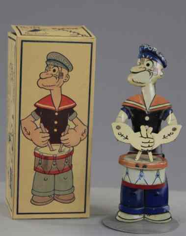 Appraisal: BOXED POPEYE THE DRUMMER Chein lithographed tin classic hand held