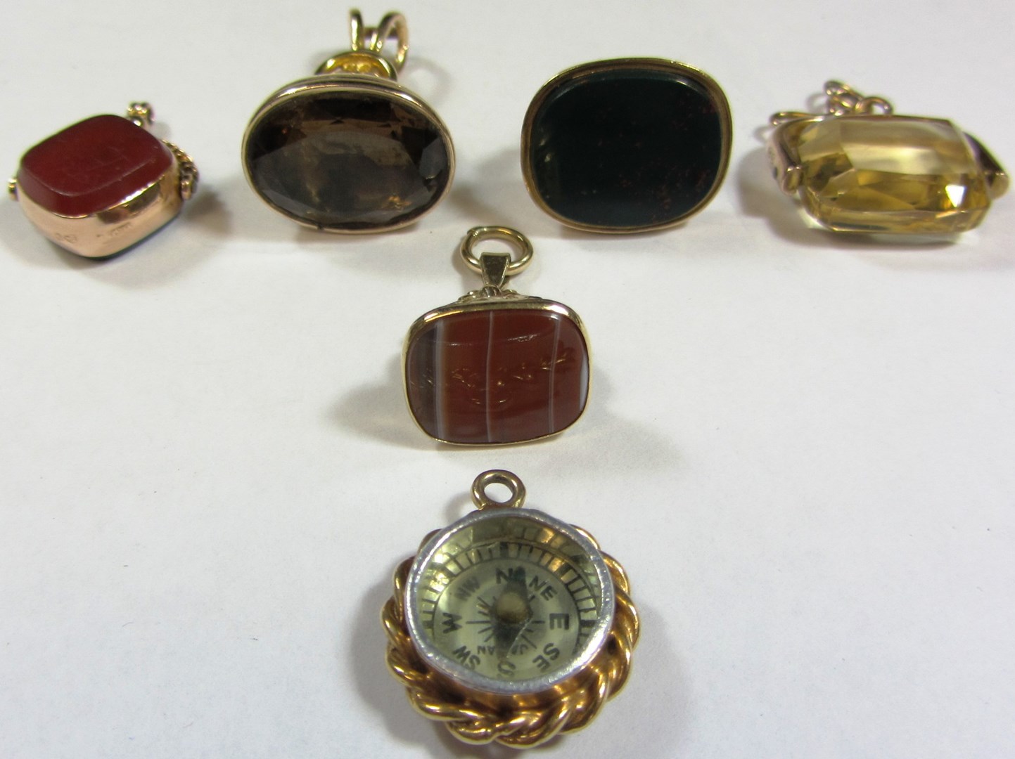 Appraisal: A ct gold mounted citrine set rotating pendant fob a