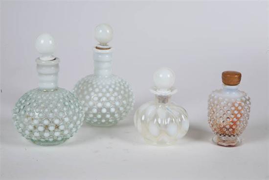 Appraisal: FOUR OPALESCENT GLASS COLOGNE BOTTLES Three are Hobnail h -