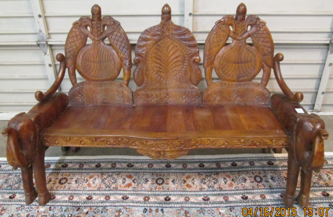 Appraisal: CARVED MAHOGANY ELEPHANT SETTEE India having a triple chair back