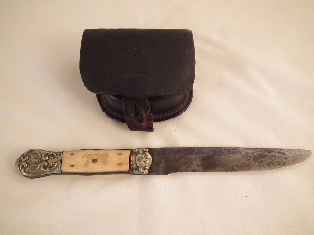 Appraisal: CONFEDERATE CAP BOX KNIFE Civil War era items a leather