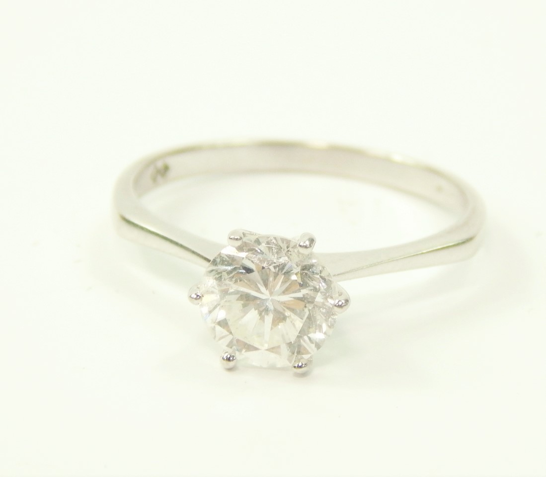 Appraisal: A white metal and diamond solitaire ring high claw set