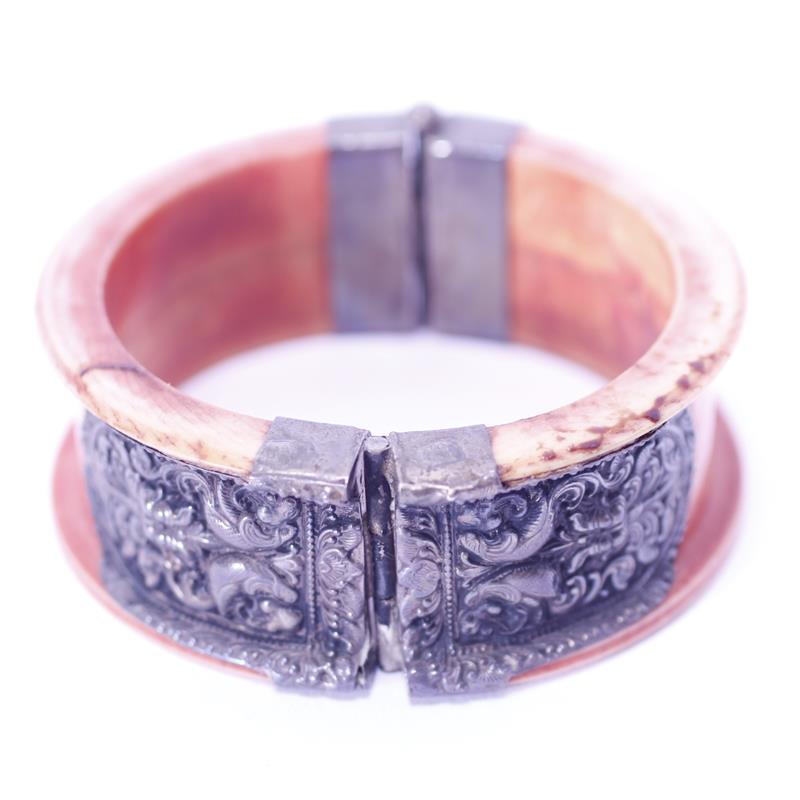 Appraisal: Asian stained Ivory hinged Bracelet Bangle Cuff with embossed silver