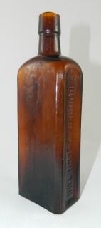 Appraisal: Bitters bottle Bitters- rectangular marked vertically on indented panel sides