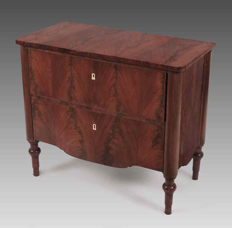 Appraisal: th C CONTINENTAL DRAWER CHEST Very pretty flame grain veneer