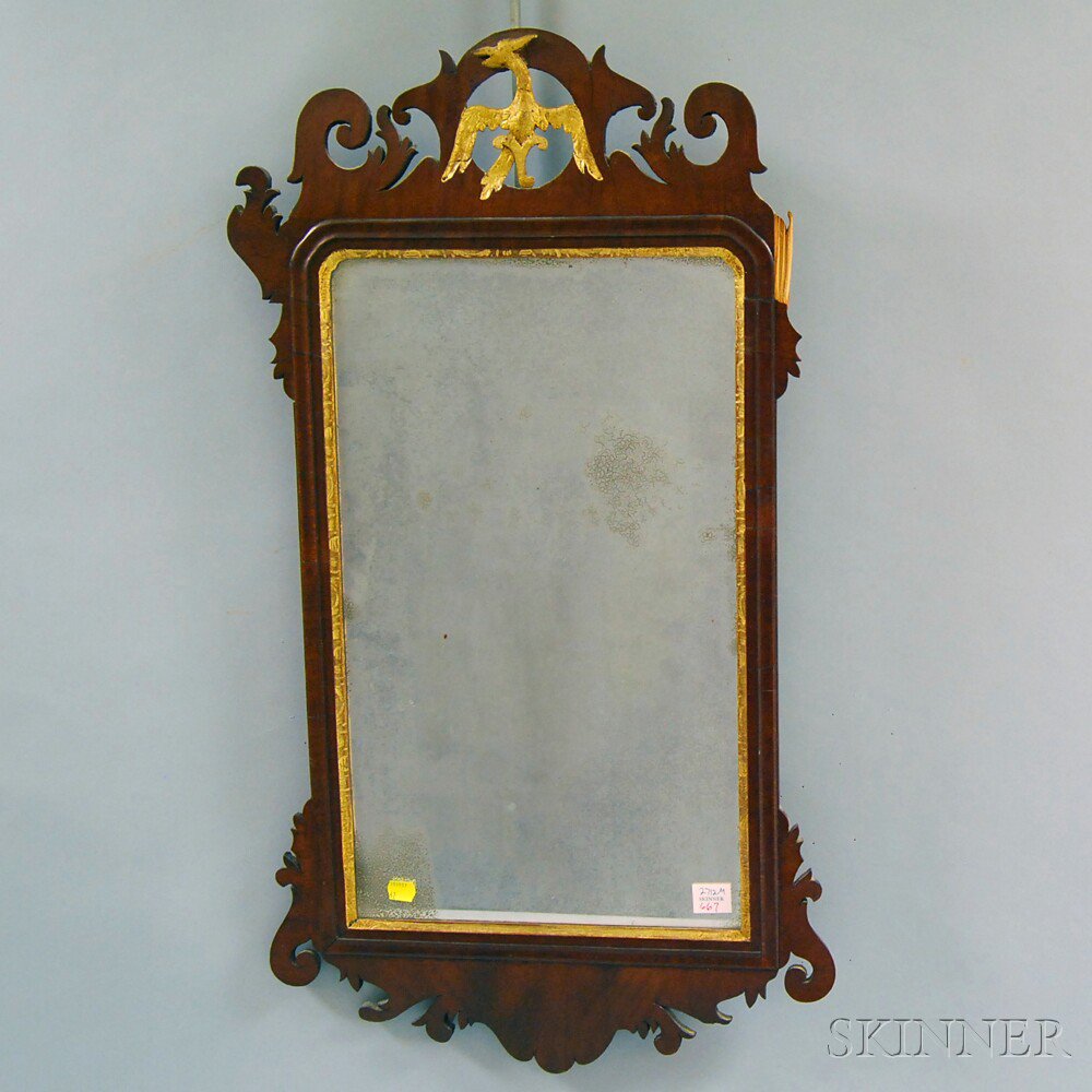 Appraisal: Chippendale Carved Mahogany Parcel-gilt Scroll-frame Mirror th century the crest