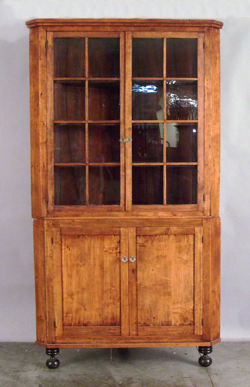 Appraisal: Butternut two piece corner cupboard th c h w