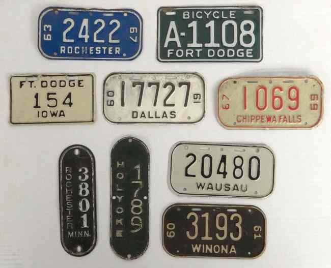 Appraisal: Lot bicycle license plates tags ''Rochester Holyoke Winona Wausau Chippewa