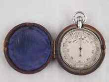 Appraisal: A white metal tests silver pocket barometer with rotating altimeter