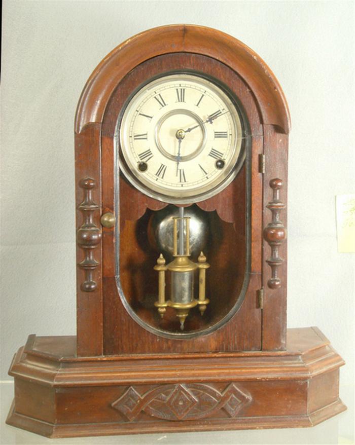 Appraisal: Walnut Gilbert mantle clock oval glass in door cracked day