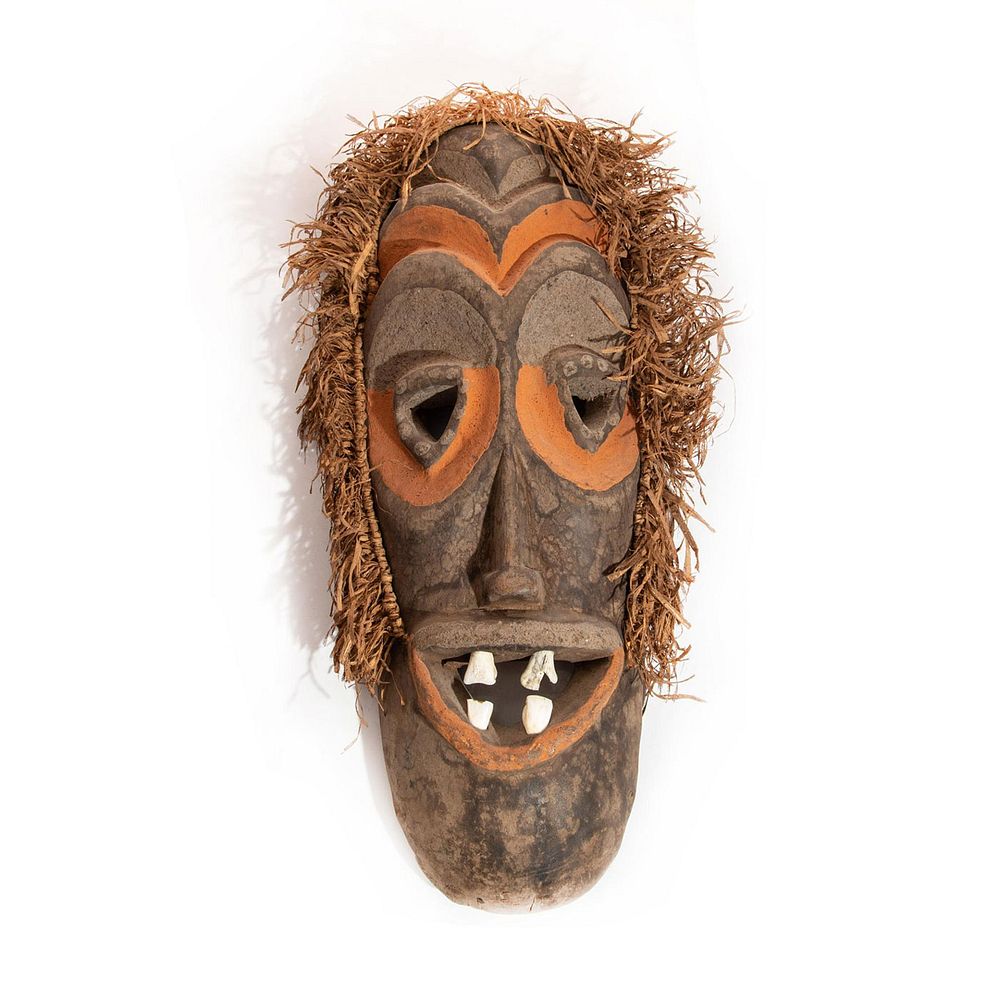 Appraisal: AFRICAN MASK CARVED WOOD W ANIMAL TEETH Oblong mask with