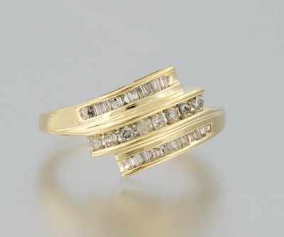 Appraisal: A Ladies' Diamond Cluster Ring k yellow gold ring of