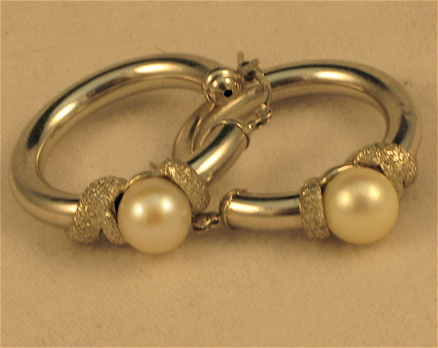 Appraisal: PAIR OF PEARL AND FOURTEEN KARAT WHITE GOLD HOOP EARRINGS