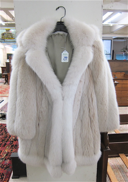 Appraisal: LADY'S FOX FUR HOODED COAT with two exterior pockets two