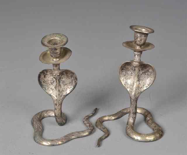 Appraisal: Pr Of Silver Plated Cobra CandlesticksDepicting a rising cobra with