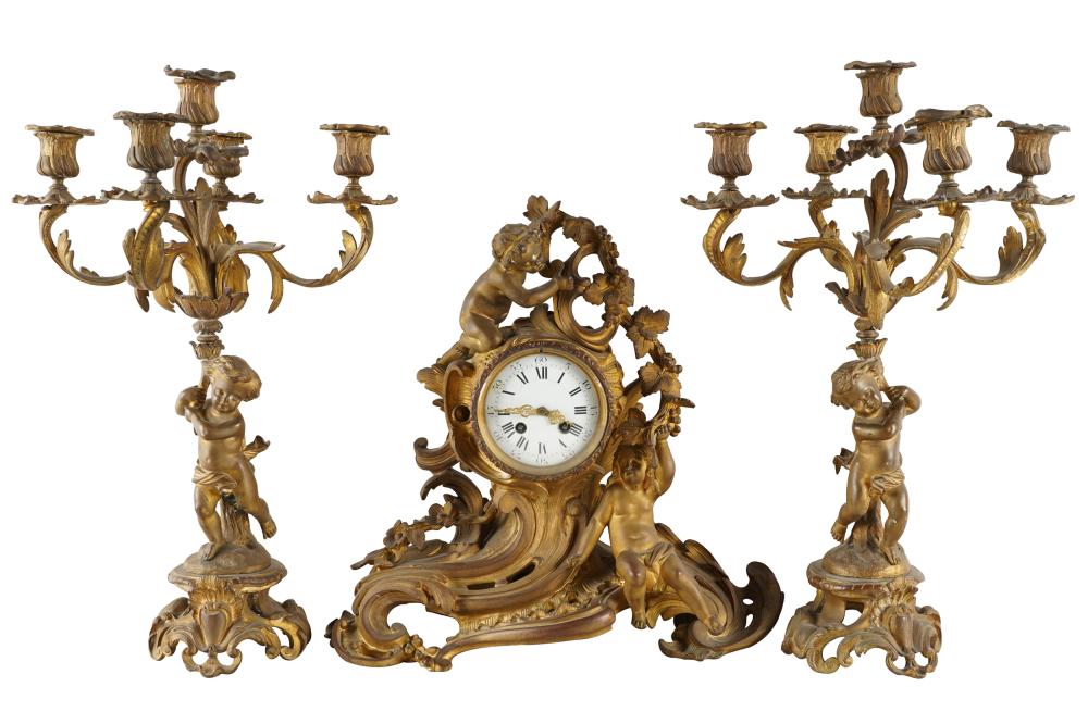 Appraisal: LOUIS XV STYLE GILT BRONZE CLOCK GARNITURE SETcomprising a mantel