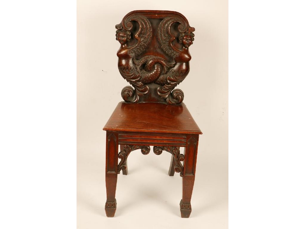 Appraisal: A REGENCY MAHOGANY HALL CHAIR with an armorial back carved