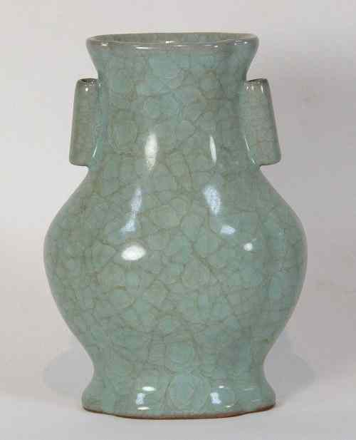 Appraisal: A Chinese crackle glazed celadon vase of elliptical baluster form