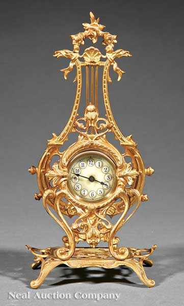 Appraisal: A Diminutive French Louis XV-Style Gilt Bronze Mantel Clock c