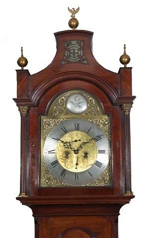 Appraisal: A GEORGE III MAHOGANY LONGCASE CLOCK having an arched brass