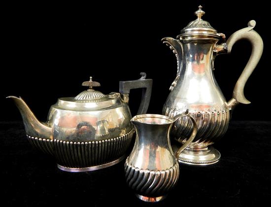 Appraisal: STERLING three serving pieces English pear form pot London gadrooned