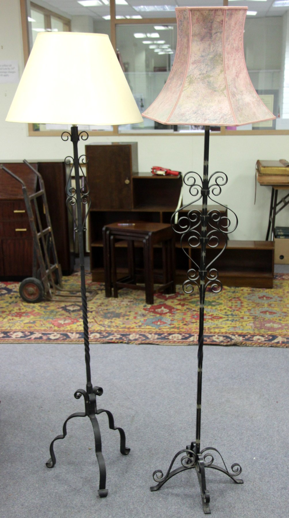 Appraisal: Two wrought iron standard lamps