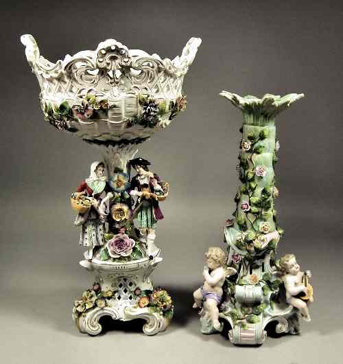 Appraisal: A Sitzendorf centrepiece modelled with a young man and woman