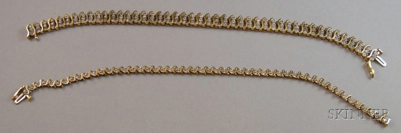 Appraisal: Two Gold and Diamond S-link Bracelets one kt with triple