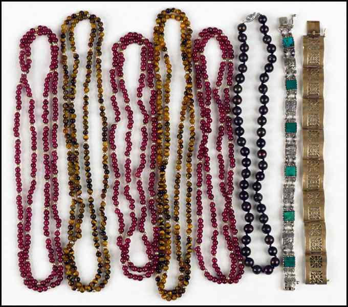 Appraisal: COLLECTION OF JEWELRY Comprised of three strands of garnet beads