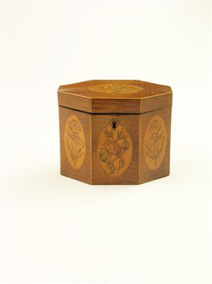 Appraisal: A George III harewood octagonal tea caddy inlaid with four