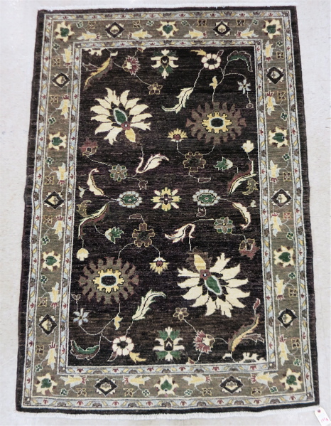 Appraisal: HAND KNOTTED ORIENTAL AREA RUG Pakistani-Persian Ziegler design a softer