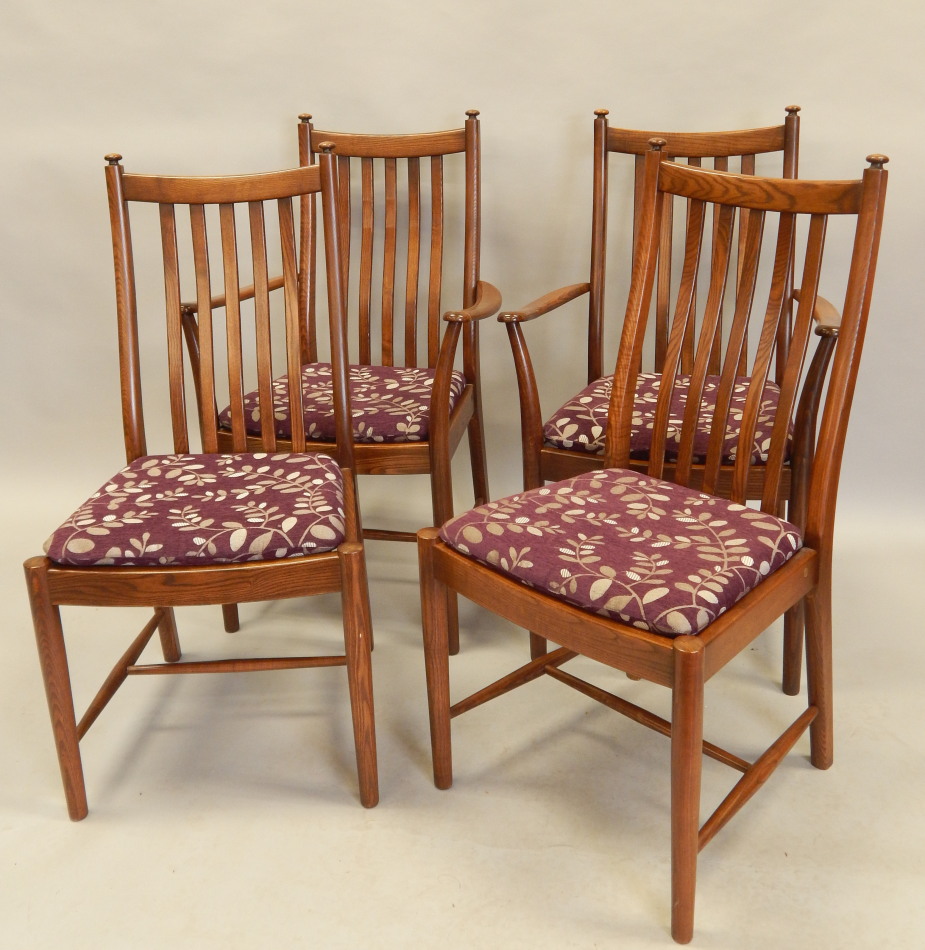 Appraisal: A set of four Ercol elm slat back dining chairs