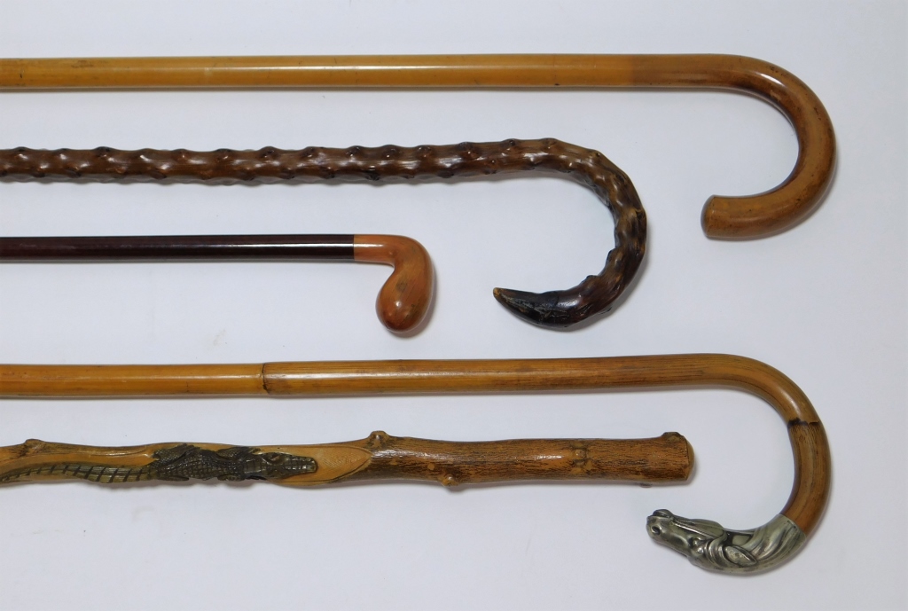 Appraisal: PC ASSORTED CARVED FIGURAL WOOD CANES United States Mexico Germany