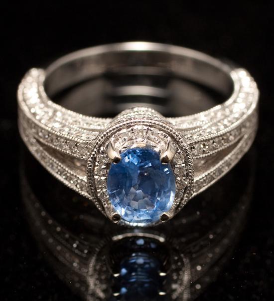 Appraisal: Lady's K white gold diamond and sapphire ring sapphire approximately