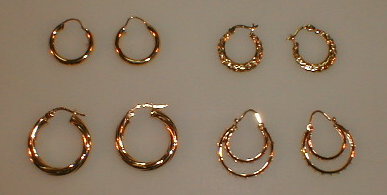 Appraisal: Four pairs of ct gold hoop earrings