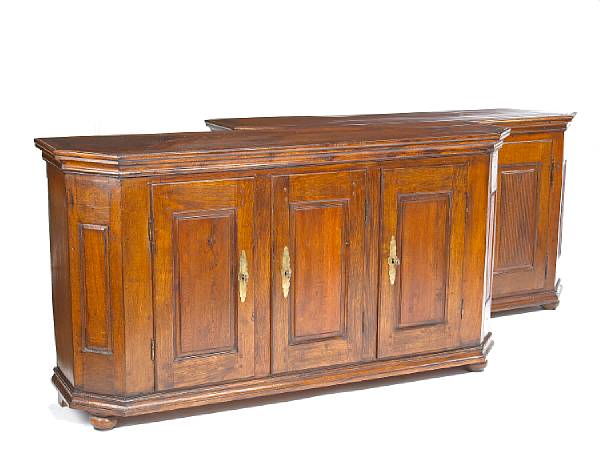 Appraisal: A near pair of Continental Neoclassical oak buffets last quarter