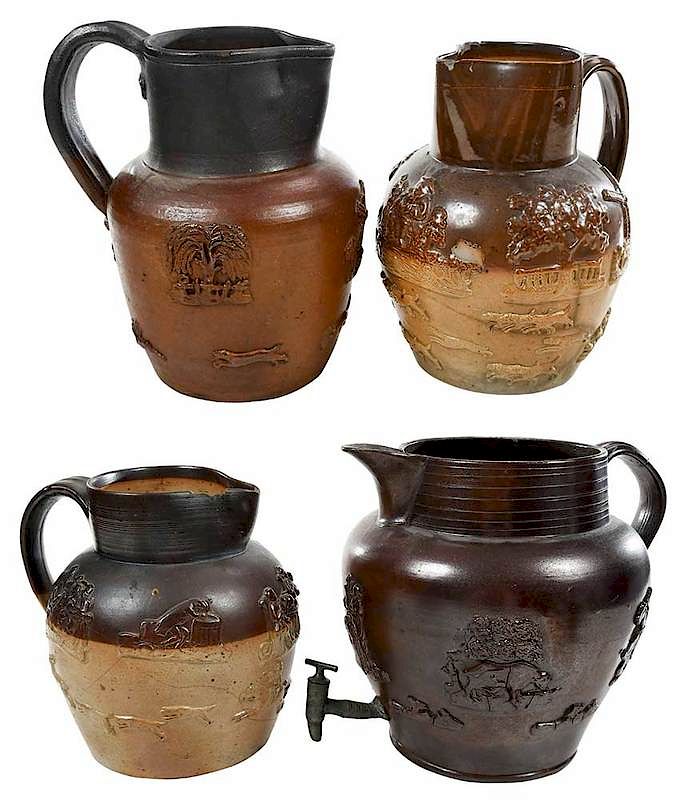 Appraisal: Four Large Sprig Decorated Stoneware Pitchers British th century largest