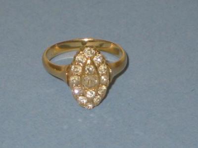 Appraisal: A VICTORIAN DIAMOND CLUSTER RING of navette form set with