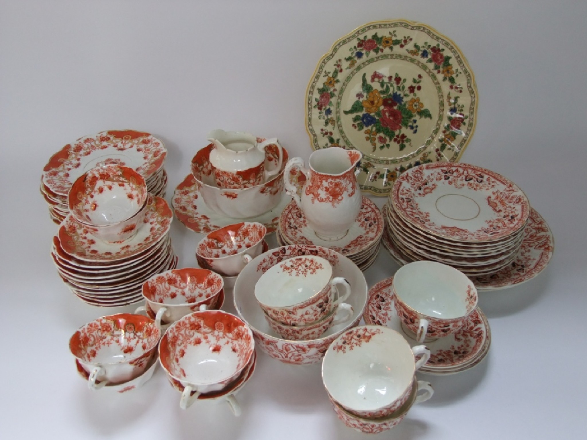 Appraisal: A quantity of late th century tea wares with orange