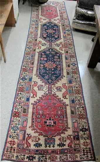 Appraisal: SEMI-ANTIQUE PERSIAN TRIBAL RUNNER Hamadan region northwestern Iran featuring a