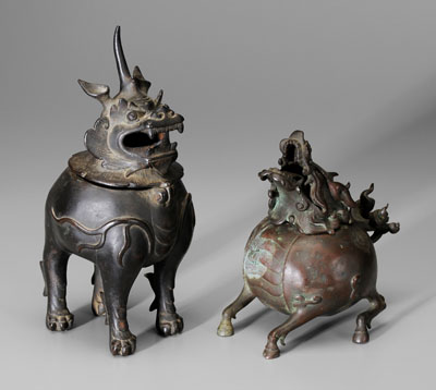 Appraisal: Two bronze qilin censers both with globular bodi