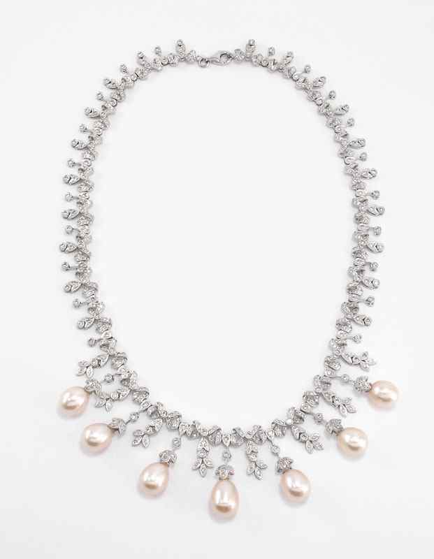 Appraisal: K CULTURED PEARL AND DIAMOND NECKLACE K white gold necklace