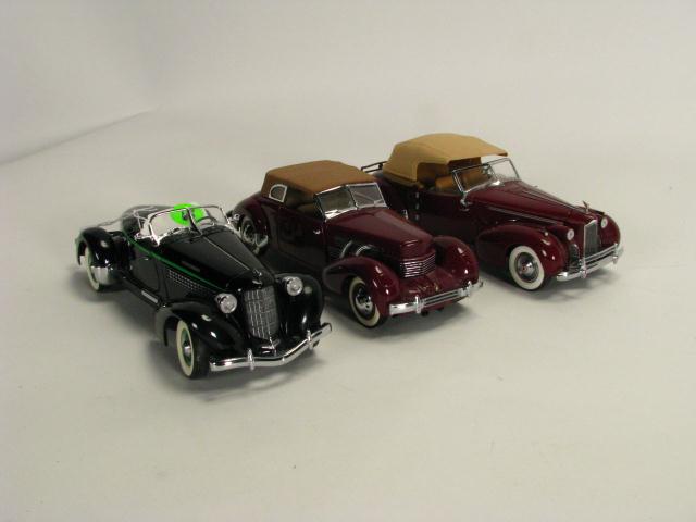 Appraisal: Group of Three Franklin Mint Collector Models including Packard Cord