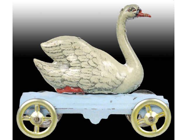 Appraisal: Lot of German Tin Penny Toys Goose and Swan Description