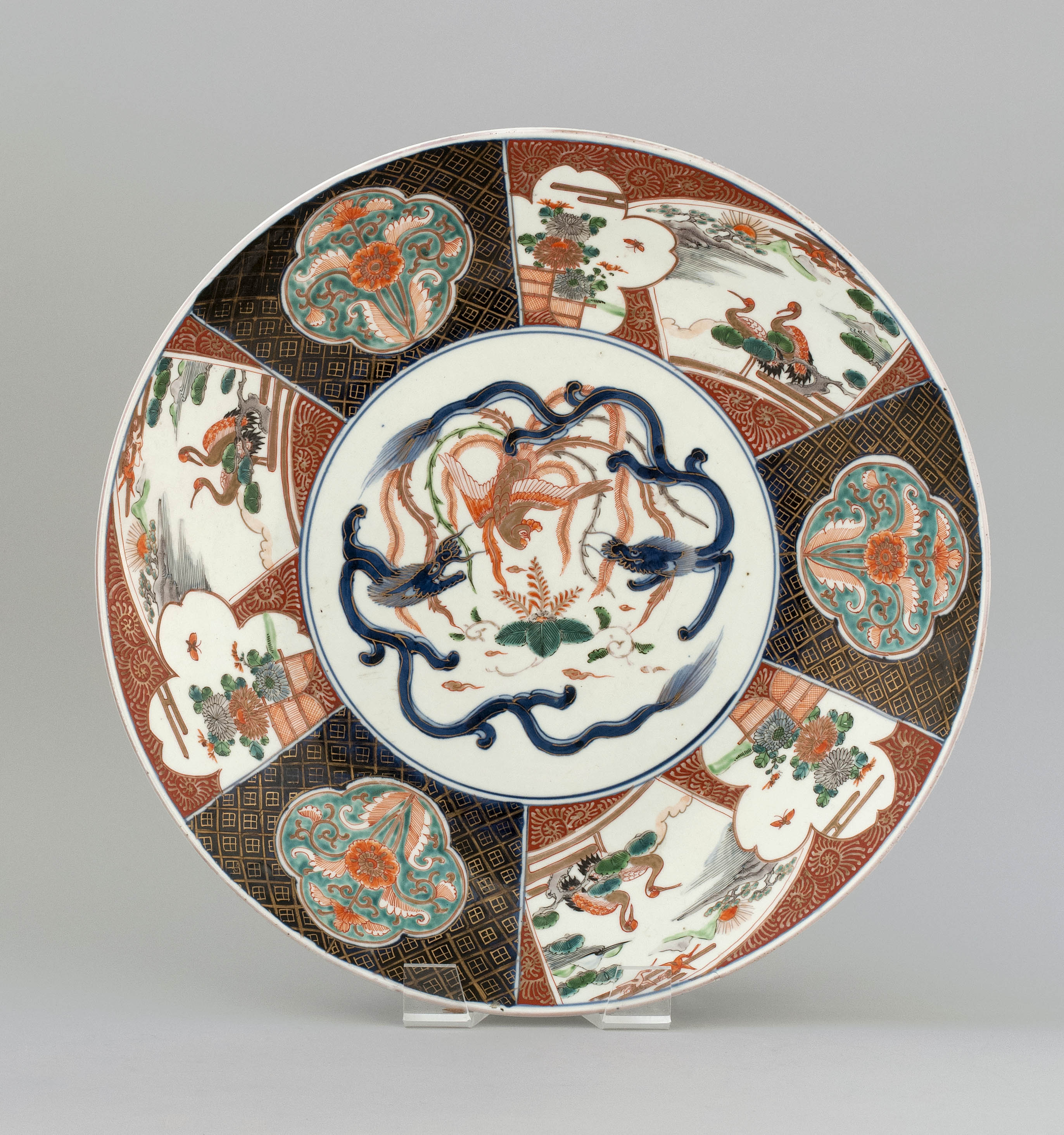 Appraisal: IMARI PORCELAIN CHARGER Meiji PeriodAlternating crane in a landscape and